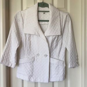 White CAbi jacket.